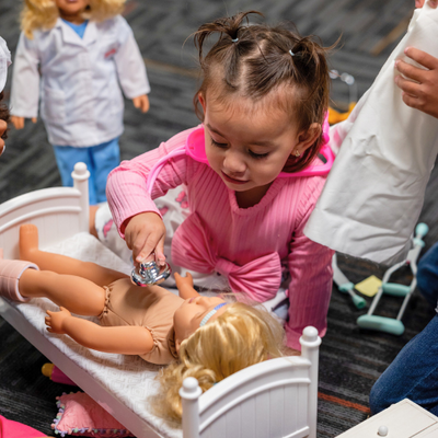 A Mother's Touch: Exploring Empathy and Care with Nurse Dolls